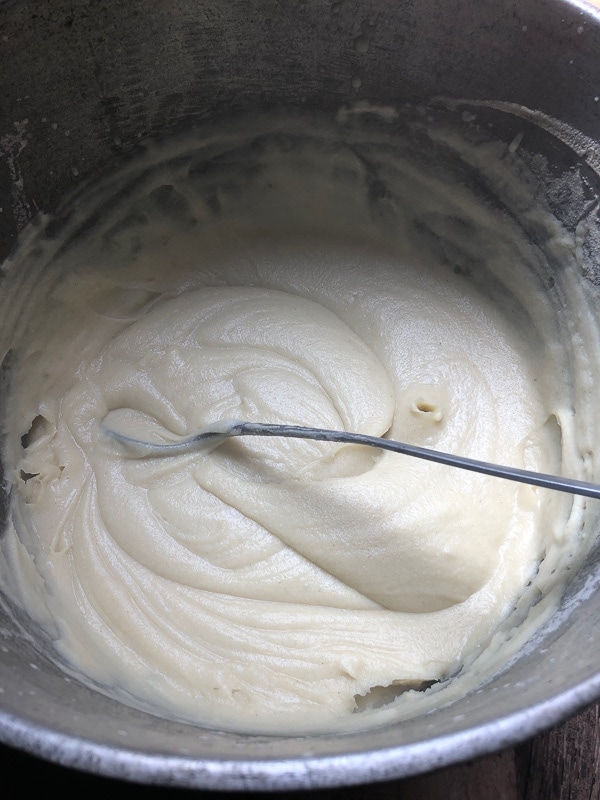 Costa Rican tamale masa in large pot- looks like cream of wheat. Ready to cook.
