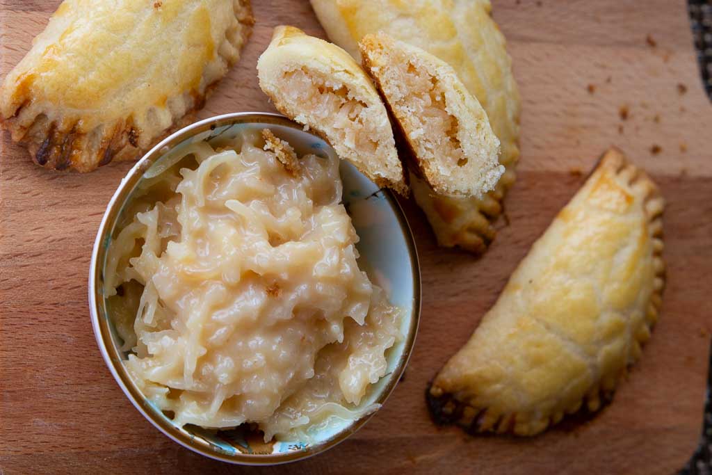 Filling and coconut empanadas.