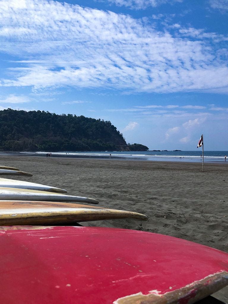 Surf boards on the beach at low tide, Jaco Costa Rica.